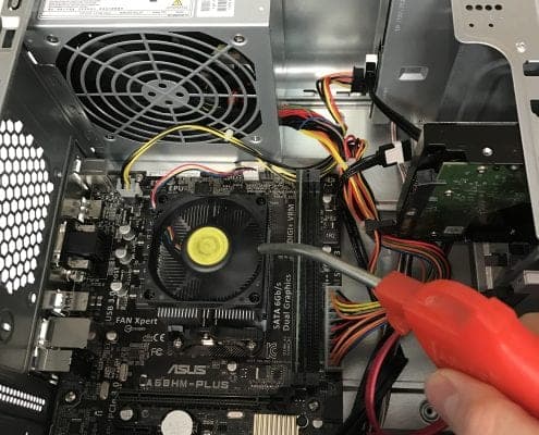 A desktop computer being serviced